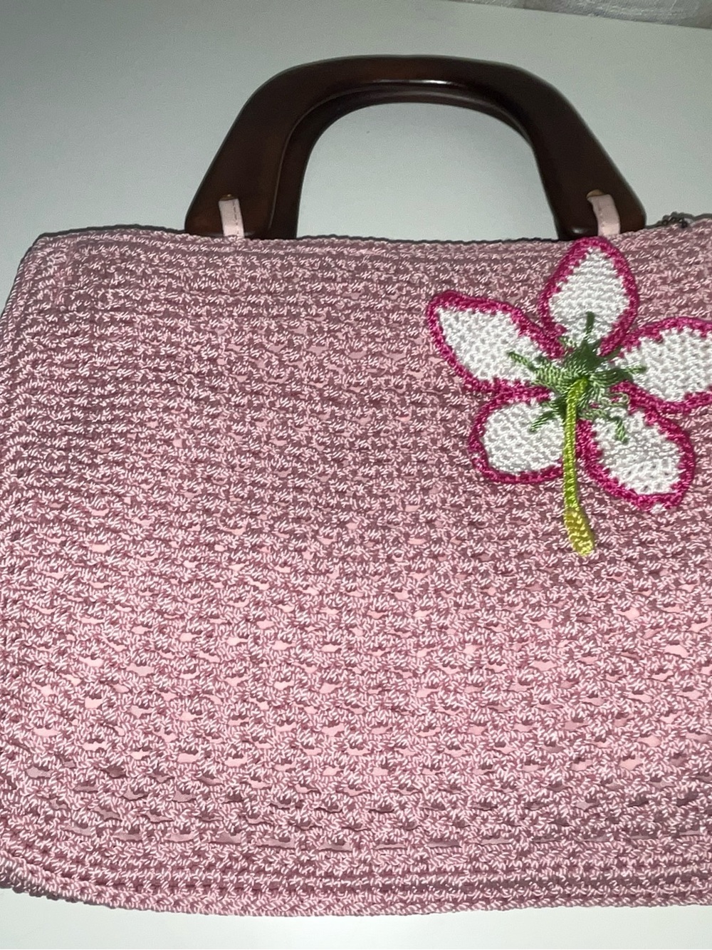 The SAK Pink Crochet Tote Bag with Brown Wooden Handles and Flower Appliqué - Picture 3 of 7